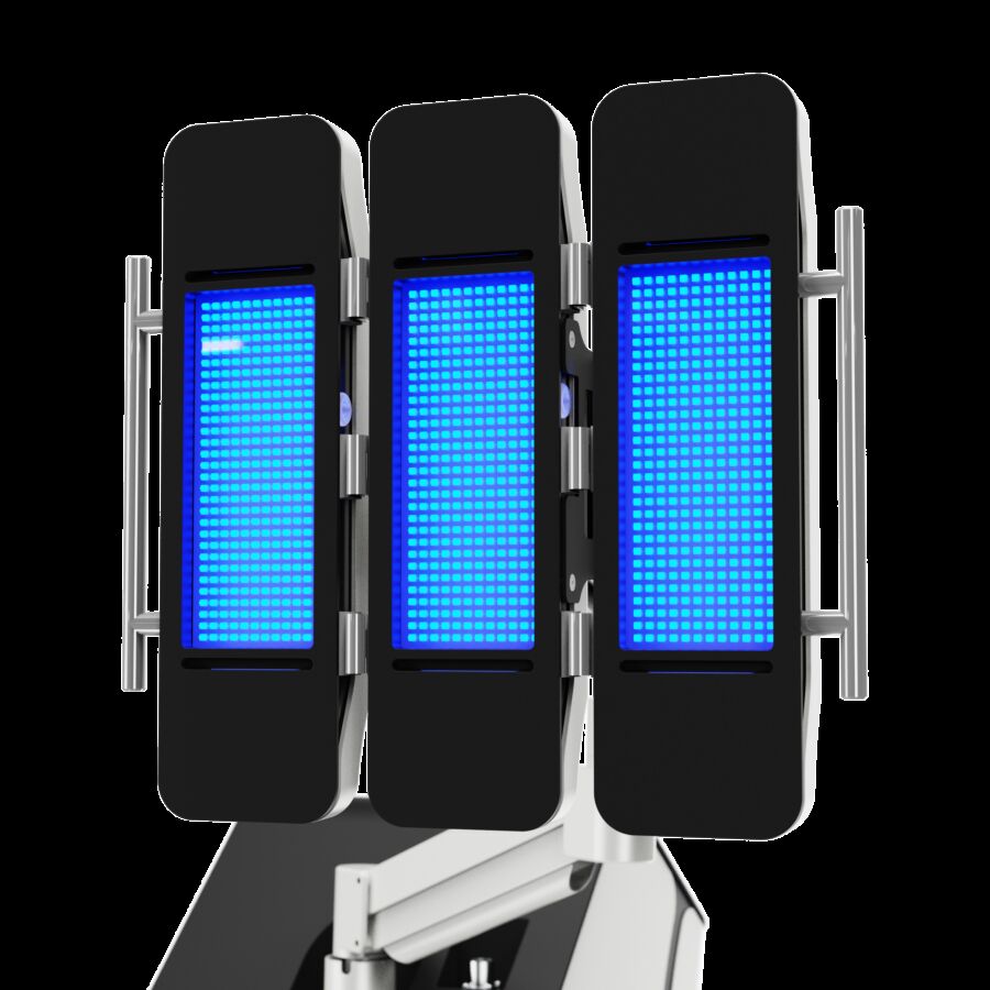 Obrázok  zobrazujúci tri panely LED žiaričov prístroja Dermalux compact light, keď svieti modrým svetlom
